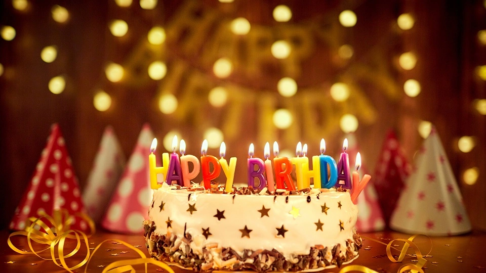Birthday Cake with Candles (Credit: Wallpaper Flare)